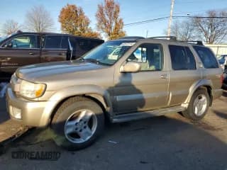 ✅ 2003 Infiniti QX4 Luxury • VIN: JNRDR09Y93W300623 • Лот: 82672114. Опубликован ранее на Copart с пробегом 214 894 миль. Бесплатный доступ к архиву аукционных продаж из США и подробный отчёт об истории автомобиля на DreamBid. Изображение 1.