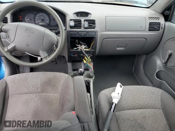 ✅ 2005 Kia Rio • VIN: KNADC125156375937 • Лот: 45710075. Опубликован ранее на Copart с пробегом 114 050 миль. Бесплатный доступ к архиву аукционных продаж из США и подробный отчёт об истории автомобиля на DreamBid. Изображение 8.