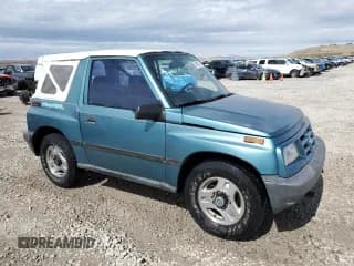 ✅ 1996 Chevrolet Tracker • VIN: 2CNBJ1869T6903615 • Лот: 49690055. Опубликован ранее на Copart с пробегом 144 821 миль. Бесплатный доступ к архиву аукционных продаж из США и подробный отчёт об истории автомобиля на DreamBid. Изображение 4.