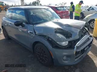 2015 MINI Hardtop with VIN WMWXM5C57F3A97003, listed as a IAAI auction lot 43442951 with 109,889 mi miles and . Bid and sale history available at DreamBid. Image 1.