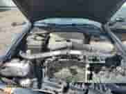 2014 Dodge Challenger SXT z VIN 2C3CDYAG0EH195293, wystawiony jako Copart lot #69801784 z przebiegiem 158 460 mil mil oraz Szkoda całkowita • Salvage title. Historia ofert i sprzedaży dostępna na DreamBid. Obrazek 12.