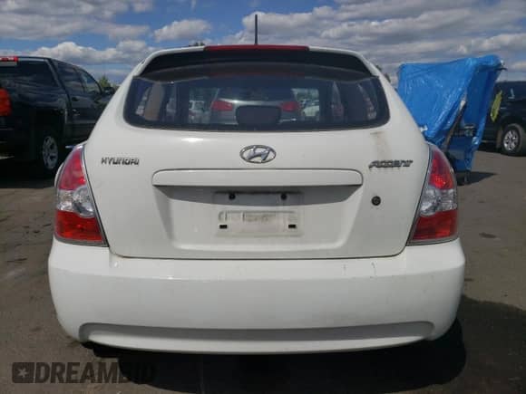 2007 Hyundai Accent GS with VIN KMHCM36C37U004904, listed as a Copart auction lot 61291504 with 158,700 mi miles and Clean title. Bid and sale history available at DreamBid. Image 6.