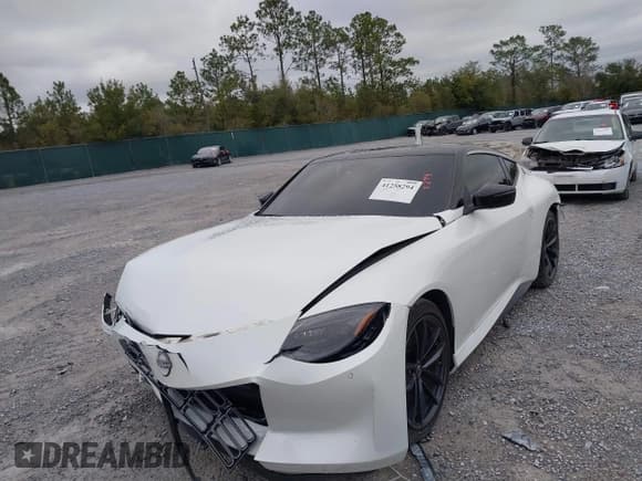 ✅ 2023 Nissan Z Performance • VIN: JN1BZ4BH3PM311131 • Лот: 41258294. Опубликован ранее на IAAI с пробегом 27 426 миль. Бесплатный доступ к архиву аукционных продаж из США и подробный отчёт об истории автомобиля на DreamBid. Изображение 2.