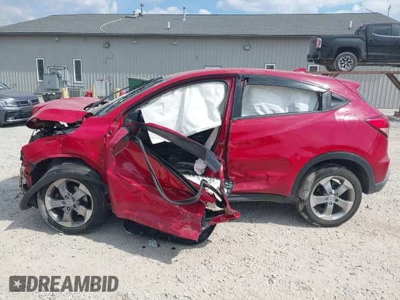 ✅ 2018 Honda HR-V LX • VIN: 3CZRU6H35JG708653 • Lot: 43241141. Listed on IAAI with 92,259 mi. Free auction sales archive from the USA and detailed vehicle history report at DreamBid. Image 13.