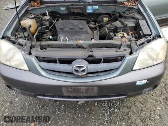 ✅ 2004 Mazda Tribute ES • VIN: 4F2CZ96134KM15248 • Лот: 49306175. Опубликован ранее на Copart с пробегом 106 256 миль. Бесплатный доступ к архиву аукционных продаж из США и подробный отчёт об истории автомобиля на DreamBid. Изображение 14.