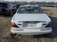 ✅ 1999 Jaguar XJ • VIN: SAJPX1841XC865402 • Лот: 46294005. Опубликован ранее на Copart с пробегом 128 814 миль. Бесплатный доступ к архиву аукционных продаж из США и подробный отчёт об истории автомобиля на DreamBid. Изображение 6.