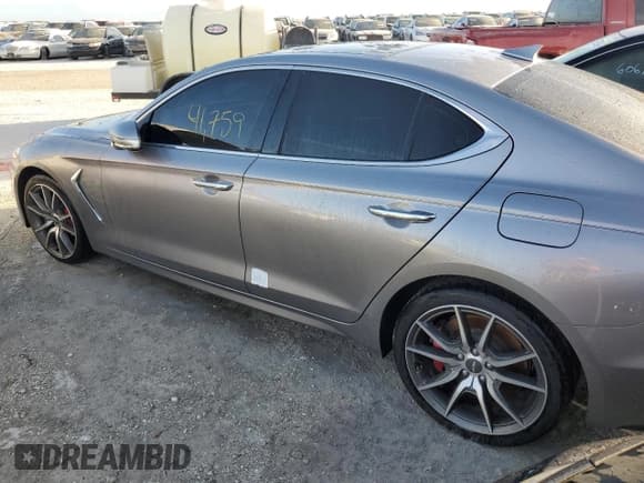 ✅ 2021 Genesis G70 3.3T • VIN: KMTG74LE1MU071782 • Лот: 74787954. Опубликован ранее на Copart с пробегом 41 759 миль. Бесплатный доступ к архиву аукционных продаж из США и подробный отчёт об истории автомобиля на DreamBid. Изображение 2.