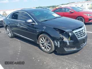 ✅ 2013 Cadillac XTS • VIN: 2G61N5S31D9238531 • Lot: 42928713. Wystawiony na IAAI z przebiegiem 146 994 mil. Bezpłatny archiwum sprzedaży aukcyjnych z USA i szczegółowy raport historii pojazdu na DreamBid. Zdjęcie 1.