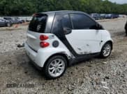 ✅ 2009 Smart fortwo Pure • VIN: WMEEJ31X99K254292 • Лот: 70000045. Опубликован ранее на Copart с пробегом 60 113 миль. Бесплатный доступ к архиву аукционных продаж из США и подробный отчёт об истории автомобиля на DreamBid. Изображение 3.