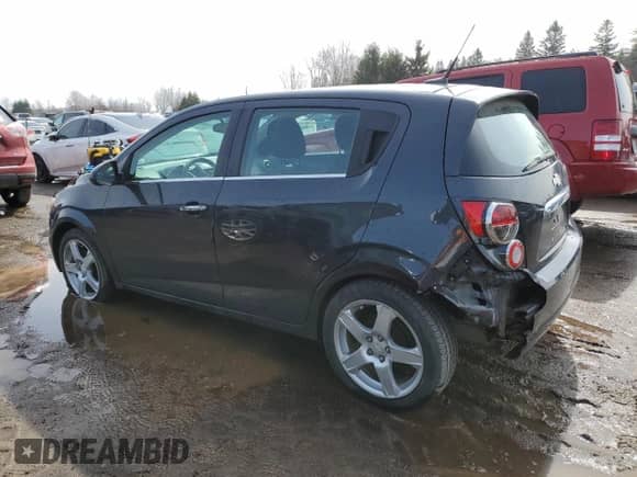 2014 Chevrolet Sonic LT z VIN 1G1JC6EH0E4209809, wystawiony jako Copart lot #51433635 z przebiegiem 127 868 mil mil oraz Czysty tytuł • Clean title. Historia ofert i sprzedaży dostępna na DreamBid. Obrazek 2.