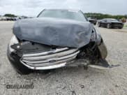 ✅ 2015 Ford Taurus SEL • VIN: 1FAHP2E8XFG101688 • Лот: 85890205. Опубликован ранее на Copart с пробегом 133 425 миль. Бесплатный доступ к архиву аукционных продаж из США и подробный отчёт об истории автомобиля на DreamBid. Изображение 5.