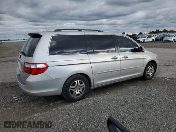 ✅ 2006 Honda Odyssey EX-L • VIN: 5FNRL387X6B039464 • Лот: 93323725. Опубликован ранее на Copart с пробегом 180 680 миль. Бесплатный доступ к архиву аукционных продаж из США и подробный отчёт об истории автомобиля на DreamBid. Изображение 3.
