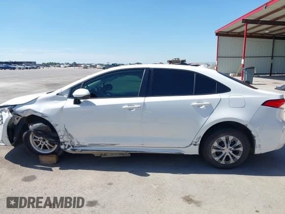 ✅ 2022 Toyota Corolla Hybrid LE • VIN: JTDEAMDEXN3003123 • Lot: 42803708. Listed on IAAI with 82,115 mi. Free auction sales archive from the USA and detailed vehicle history report at DreamBid. Image 14.