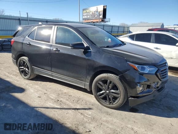 ✅ 2021 Chevrolet Equinox LT • VIN: 2GNAXUEV1M6114394 • Lot: 46875715. Listed on Copart with 101,799 mi. Free auction sales archive from the USA and detailed vehicle history report at DreamBid. Image 4.