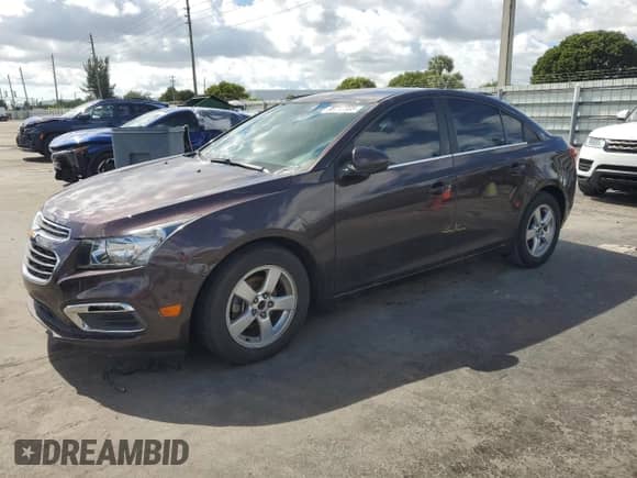 2015 Chevrolet Cruze LT z VIN 1G1PC5SB3F7117940, wystawiony jako Copart lot #86717305 z przebiegiem 77 613 mil mil oraz Szkoda całkowita • Salvage title. Historia ofert i sprzedaży dostępna na DreamBid. Obrazek 1.