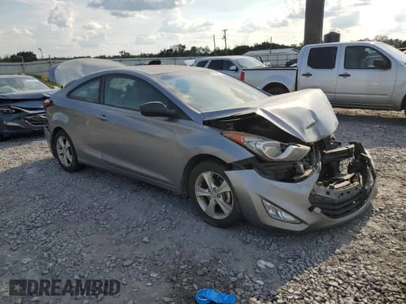 2013 Hyundai Elantra GS with VIN KMHDH6AE1DU009789, listed as a Copart auction lot 71904565 with 142,187 mi miles and Salvage title. Bid and sale history available at DreamBid. Image 4.