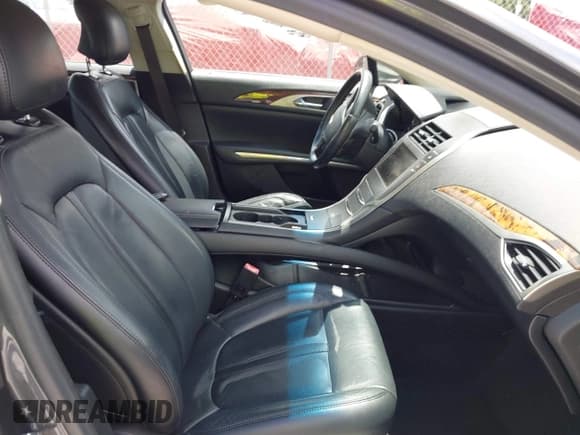 ✅ 2015 Lincoln MKZ Hybrid • VIN: 3LN6L2LU4FR602724 • Lot: 42974274. Listed on IAAI with 81,318 mi. Free auction sales archive from the USA and detailed vehicle history report at DreamBid. Image 5.