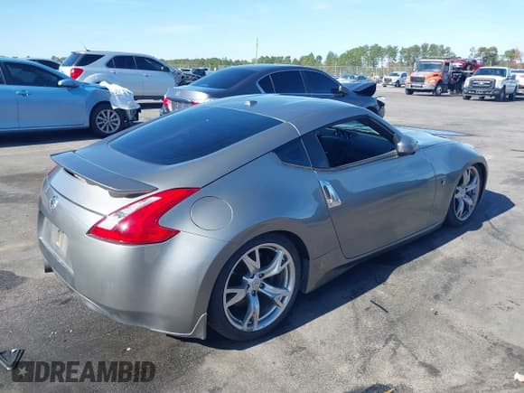 ✅ 2009 Nissan 370Z Touring • VIN: JN1AZ44E39M404491 • Lot: 43672244. Listed on IAAI with 118,427 mi. Free auction sales archive from the USA and detailed vehicle history report at DreamBid. Image 4.