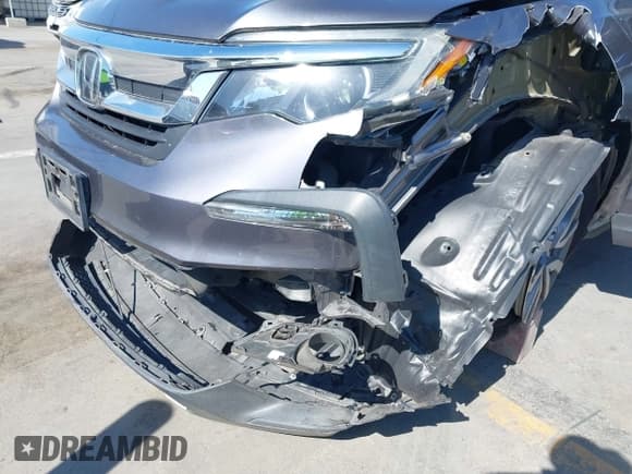 ✅ 2019 Honda Pilot EX-L • VIN: 5FNYF5H5XKB025457 • Lot: 42153274. Listed on IAAI with 71,956 mi. Free auction sales archive from the USA and detailed vehicle history report at DreamBid. Image 6.