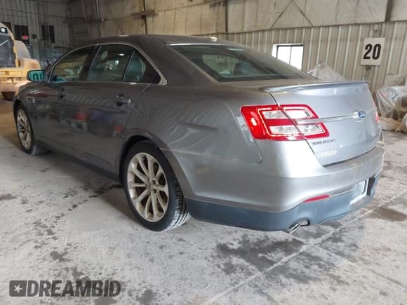 ✅ 2013 Ford Taurus Limited • VIN: 1FAHP2F85DG166167 • Lot: 42529202. Listed on IAAI with 128,945 mi. Free auction sales archive from the USA and detailed vehicle history report at DreamBid. Image 3.