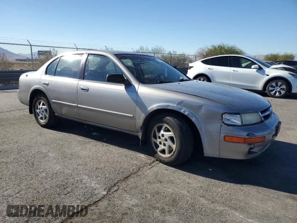 ✅ 1998 Nissan Maxima GXE • VIN: JN1CA21A6WT303680 • Лот: 82739425. Опубликован ранее на Copart с пробегом 121 593 миль. Бесплатный доступ к архиву аукционных продаж из США и подробный отчёт об истории автомобиля на DreamBid. Изображение 4.