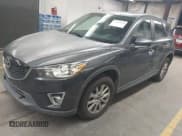 ✅ 2014 Mazda CX-5 Touring • VIN: JM3KE4CY0E0430130 • Lot: 43830898. Wystawiony na IAAI z przebiegiem 169 053 mil. Bezpłatny archiwum sprzedaży aukcyjnych z USA i szczegółowy raport historii pojazdu na DreamBid. Zdjęcie 2.