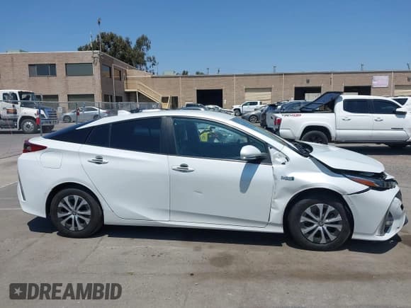 ✅ 2021 Toyota Prius LE • VIN: JTDKAMFP3M3187644 • Lot: 42443171. Wystawiony na IAAI z przebiegiem 126 977 mil. Bezpłatny archiwum sprzedaży aukcyjnych z USA i szczegółowy raport historii pojazdu na DreamBid. Zdjęcie 12.