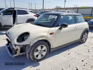2017 MINI Hardtop Cooper with VIN WMWXP5C39H2F61522, listed as a Copart auction lot 65021755 with 106,661 mi miles and Salvage title. Bid and sale history available at DreamBid. Image 1.