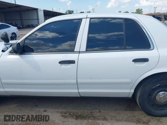 ✅ 2005 Ford Police Interceptor • VIN: 2FAFP71W05X155261 • Лот: 43137018. Опубликован ранее на IAAI с пробегом 222 000 миль. Бесплатный доступ к архиву аукционных продаж из США и подробный отчёт об истории автомобиля на DreamBid. Изображение 14.