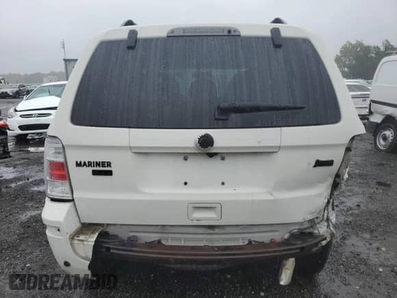 2010 Mercury Mariner Premier с VIN 4M2CN9HG1AKJ28171, выставлен на аукционе Copart как лот 80882805 с пробегом 124 347 миль миль и Списание • Salvage title. История ставок и продаж доступна на DreamBid. Изображение 6.