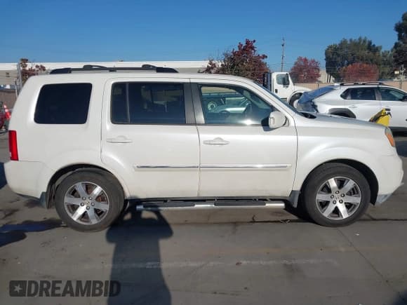 ✅ 2013 Honda Pilot Touring • VIN: 5FNYF4H94DB032372 • Lot: 43906615. Wystawiony na IAAI z przebiegiem 204 065 mil. Bezpłatny archiwum sprzedaży aukcyjnych z USA i szczegółowy raport historii pojazdu na DreamBid. Zdjęcie 13.