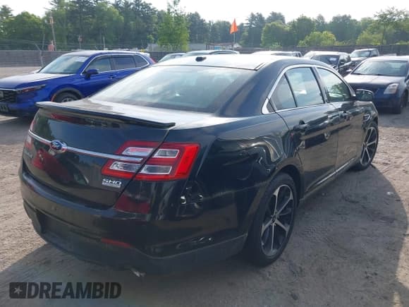 ✅ 2014 Ford Taurus SHO • VIN: 1FAHP2KT5EG136579 • Lot: 42384706. Listed on IAAI with 82,514 mi. Free auction sales archive from the USA and detailed vehicle history report at DreamBid. Image 4.