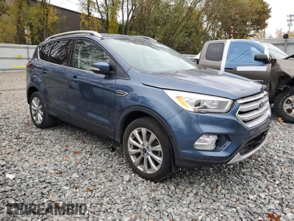 ✅ 2018 Ford Escape Titanium • VIN: 1FMCU9J92JUB01162 • Lot: 90094025. Wystawiony na Copart z przebiegiem Nie podano. Bezpłatny archiwum sprzedaży aukcyjnych z USA i szczegółowy raport historii pojazdu na DreamBid. Zdjęcie 4.