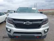 ✅ 2018 Chevrolet Colorado 4WD LT • VIN: 1GCGTCEN2J1252873 • Лот: 43782665. Опубликован ранее на IAAI с пробегом 52 415 миль. Бесплатный доступ к архиву аукционных продаж из США и подробный отчёт об истории автомобиля на DreamBid. Изображение 12.