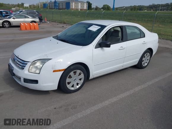 ✅ 2007 Ford Fusion S • VIN: 3FAHP06Z07R258328 • Лот: 43454699. Опубликован ранее на IAAI с пробегом 184 783 миль. Бесплатный доступ к архиву аукционных продаж из США и подробный отчёт об истории автомобиля на DreamBid. Изображение 2.