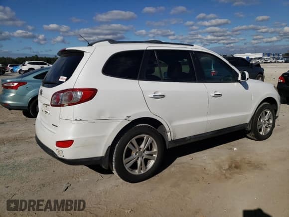 ✅ 2012 Hyundai Santa Fe Limited • VIN: 5XYZKDAG4CG159736 • Lot: 81399854. Listed on Copart with 230,825 mi. Free auction sales archive from the USA and detailed vehicle history report at DreamBid. Image 3.