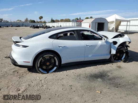 ✅ 2023 Porsche Taycan Turbo • VIN: WP0AC2Y13PSA52227 • Лот: 77098703. Опубликован ранее на Copart с пробегом Не указан. Бесплатный доступ к архиву аукционных продаж из США и подробный отчёт об истории автомобиля на DreamBid. Изображение 3.