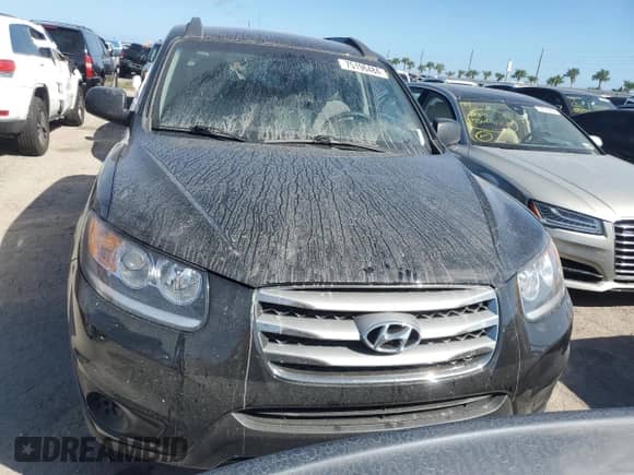 2012 Hyundai Santa Fe GLS с VIN 5XYZG3AB1CG126290, выставлен на аукционе Copart как лот 75196484 с пробегом Не указан миль и Списание • Salvage title. История ставок и продаж доступна на DreamBid. Изображение 5.