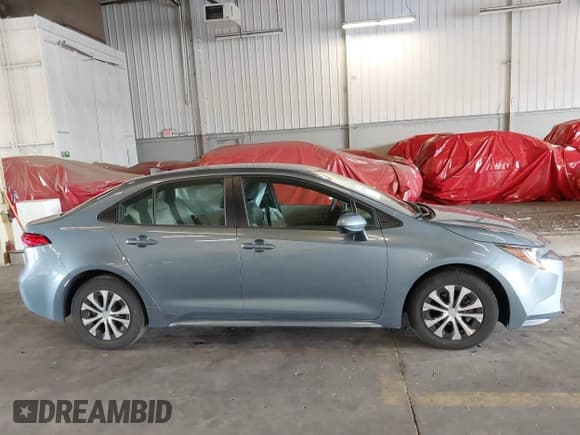 ✅ 2022 Toyota Corolla Hybrid LE • VIN: JTDEAMDE5N3011629 • Lot: 43001535. Listed on IAAI with 34,385 mi. Free auction sales archive from the USA and detailed vehicle history report at DreamBid. Image 13.