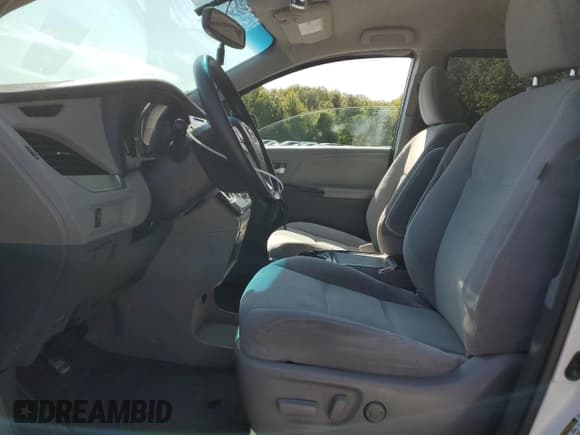 ✅ 2015 Toyota Sienna LE AAS • VIN: 5TDKK3DC3FS589057 • Lot: 80193055. Listed on Copart with 168,458 mi. Free auction sales archive from the USA and detailed vehicle history report at DreamBid. Image 7.