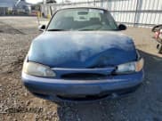 ✅ 1998 Ford Escort SE • VIN: 1FAFP13P1WW167919 • Lot: 72810024. Wystawiony na Copart z przebiegiem 211 520 mil. Bezpłatny archiwum sprzedaży aukcyjnych z USA i szczegółowy raport historii pojazdu na DreamBid. Zdjęcie 5.