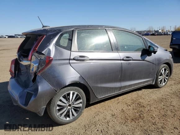 ✅ 2017 Honda Fit EX-L • VIN: 3HGGK5H82HM103057 • Лот: 86509645. Опубликован ранее на Copart с пробегом 101 528 миль. Бесплатный доступ к архиву аукционных продаж из США и подробный отчёт об истории автомобиля на DreamBid. Изображение 3.