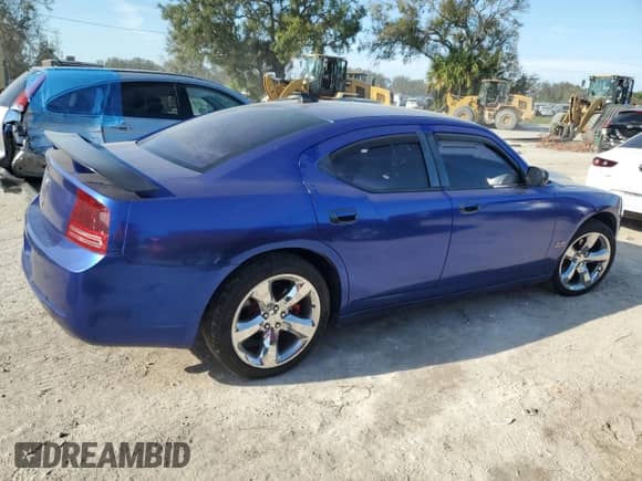 2006 Dodge Charger R/T with VIN 2B3KA53H76H521937, listed as a Copart auction lot 77455534 with 103,060 mi miles and Salvage title. Bid and sale history available at DreamBid. Image 3.