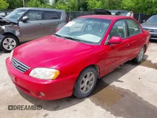 ✅ 2003 Kia Spectra • VIN: KNAFB121335301950 • Лот: 42433395. Опубликован ранее на IAAI с пробегом 101 534 миль. Бесплатный доступ к архиву аукционных продаж из США и подробный отчёт об истории автомобиля на DreamBid. Изображение 2.