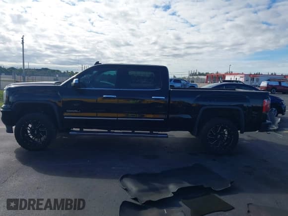 ✅ 2016 GMC Sierra 1500 Denali • VIN: 3GTU2PEC4GG307121 • Lot: 43700033. Listed on IAAI with 218,929 mi. Free auction sales archive from the USA and detailed vehicle history report at DreamBid. Image 14.