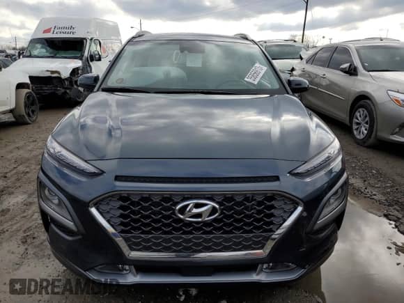 2020 Hyundai Kona Ultimate z VIN KM8K53A5XLU533617, wystawiony jako Copart lot #35856913 z przebiegiem 16 090 mil mil oraz . Historia ofert i sprzedaży dostępna na DreamBid. Obrazek 5.