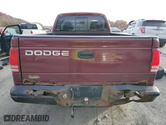 2002 Dodge Dakota z VIN 1B7FL16X22S668515, wystawiony jako Copart lot #78352644 z przebiegiem 214 222 mil mil oraz Szkoda całkowita • Salvage title. Historia ofert i sprzedaży dostępna na DreamBid. Obrazek 10.