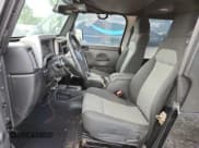 ✅ 2006 Jeep Wrangler Unlimited LWB • VIN: 1J4FA44S26P755784 • Lot: 64491985. Wystawiony na Copart z przebiegiem Nie podano. Bezpłatny archiwum sprzedaży aukcyjnych z USA i szczegółowy raport historii pojazdu na DreamBid. Zdjęcie 7.