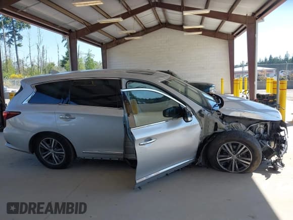 ✅ 2019 Infiniti QX60 Luxe • VIN: 5N1DL0MM9KC569612 • Lot: 42372977. Listed on IAAI with 113,077 mi. Free auction sales archive from the USA and detailed vehicle history report at DreamBid. Image 14.