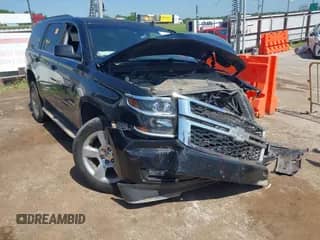 2015 Chevrolet Tahoe LT z VIN 1GNSKBKC2FR124014, wystawiony jako IAAI lot #42695829 z przebiegiem 197 062 mil mil oraz . Historia ofert i sprzedaży dostępna na DreamBid. Obrazek 1.